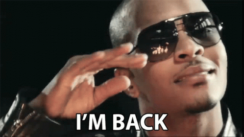 man in sunglasses singing "I'm Back"