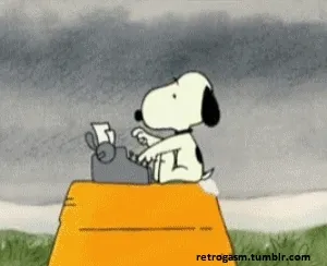 Snoopy typing on a typewriter